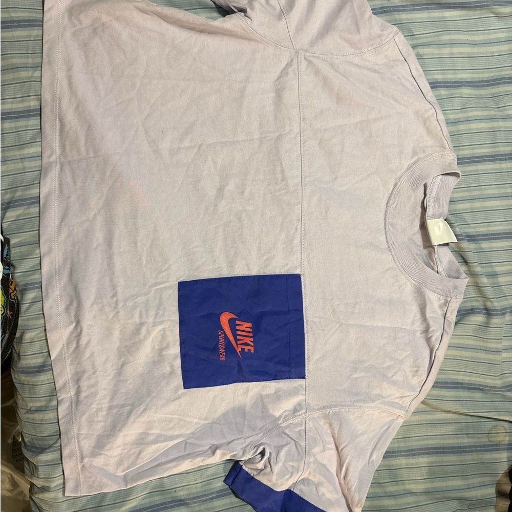 Nike Light Purple Tee with Blue Pocket and Orange Logo